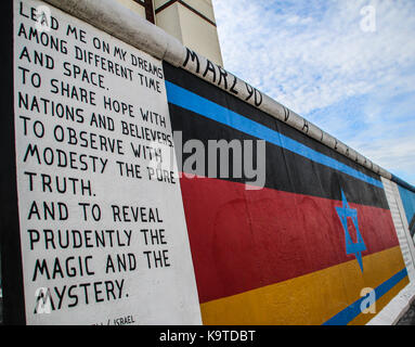 The East Side Gallery's murales are the street-art in Berlin, painted on their own famous wall Stock Photo