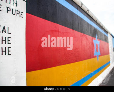 The East Side Gallery's murales are the street-art in Berlin, painted on their own famous wall Stock Photo