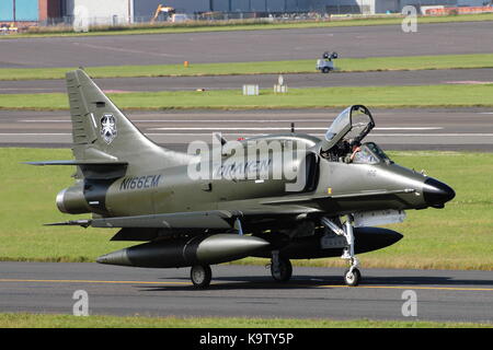 N166EM, a Douglas A-4N Skyhawk operated by Draken International's Aggressor Squadron, at Glasgow Prestwick Airport in Ayrshire. Stock Photo