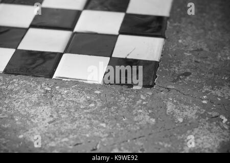 The abstract image of chess board on the table that capture at the corner(black and white theme) Stock Photo