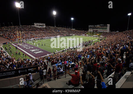 Las Cruces, NM, USA. 23rd Sep, 2017. New Mexico State's fans celebrate a touchdown during the first half of an NCAA college football game in Las Cruces, N.M., Saturday, Sep. 23, 2017. Credit: Andres Leighton/Albuquerque Journal/ZUMA Wire/Alamy Live News Stock Photo