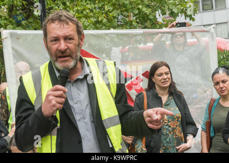London, UK. 23rd Sep, 2017. London, UK. 23rd September 2017. One of the speakers from the organising group StopHDV speaks at the rally before hundreds march in North London from Tottenham to Finsbury Park against the so called Haringey Development Vehicle, under which Haringey Council is making a huge transfer of council housing to Australian multinational Lendlease. This will result in the imminent demolition of over 1,300 council homes on the Northumberland Park estate, followed by similar loss of social housing across the whole of the borough. At Â£2 billion, his is the largest giveaw Stock Photo