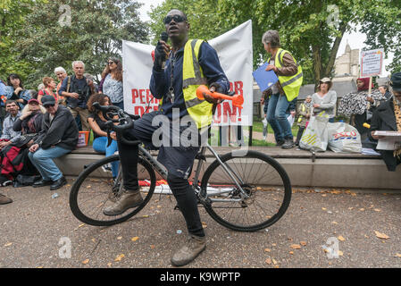 London, UK. 23rd Sep, 2017. London, UK. 23rd September 2017. Jacob, a resident of Northumberland Park, one of the first estates to be demolished under the Haringey Development Vehicle speaks at the rally in Tottenham before hundreds march to Finsbury Park against the HDV. Haringey Council is proposing a huge transfer of council housing to Australian multinational Lendlease. This will result in the imminent demolition of over 1,300 council homes on the Northumberland Park estate, followed by similar loss of social housing across the whole of the borough. At Â£2 billion, his is the larges Stock Photo