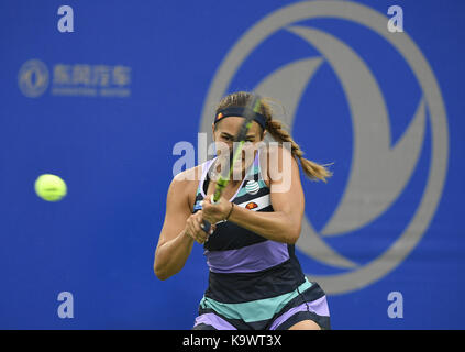 Wuhan, China. 24th September, 2017.  Monica Puig of Puerto Rico returns the ball during the singles' first round match against Mona Barthel of Germany at 2017 WTA Wuhan Open in Wuhan, capital of central China's Hubei Province, on Sept. 24, 2017. Monica Puig won 2-1. (Xinhua/Wang Peng)(wdz) Stock Photo