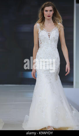 London, UK. 24th Sep, 2017. London Olympia staging the National Wedding Show with a show-stopping Catwalk, The Runway show is the flagship feature of the event and showcases a selection of dresses from top designers to highstreet names.Paul Quezada-Neiman/Alamy Live News Credit: Paul Quezada-Neiman/Alamy Live News Stock Photo