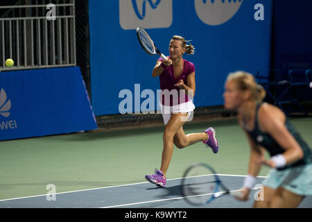 Wuhan, China. 24th September, 2017. Anna-Lena Groenefeld of Germany and Kveta Peschke (L) of the Czech Republic return the ball during the doubles' first round match against Olga Savchuk of Ukraine and Katarina Srebotnik of Slovenia at 2017 WTA Wuhan Open in Wuhan, capital of central China's Hubei Province, on Sept. 24, 2017. Anna-Lena Groenefeld and Kveta Peschke won 2-1. (Xinhua/Zhang Duan)(wll) Stock Photo