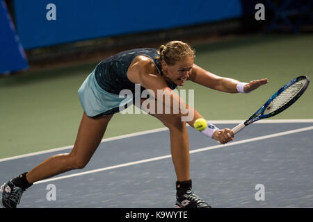 Wuhan, China. 24th September, 2017. Anna-Lena Groenefeld of Germany returns the ball during the doubles' first round match against Olga Savchuk of Ukraine and Katarina Srebotnik of Slovenia at 2017 WTA Wuhan Open in Wuhan, capital of central China's Hubei Province, on Sept. 24, 2017. Anna-Lena Groenefeld and her partner Kveta Peschke of the Czech Republic won 2-1. (Xinhua/Zhang Duan)(wll) Stock Photo
