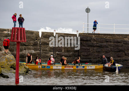 Aberystwyth, Ceredigion, Wales, UK 24th September 2017. UK Weather: Competitors in Aberystwyth rowing regatta endured high swells with a mixture of rain and dry conditions as they competed the course along Cardigan Bay just off Aberystwyth. © Ian Jones/Alamy Live News. Stock Photo