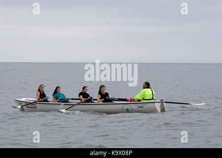 Aberystwyth, Ceredigion, Wales, UK 24th September 2017. UK Weather: Competitors in Aberystwyth rowing regatta endured high swells with a mixture of rain and dry conditions as they competed the course along Cardigan Bay just off Aberystwyth. © Ian Jones/Alamy Live News. Stock Photo