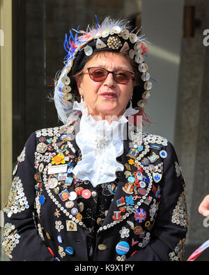 City of London, 24th Sept 2017. The annual Pearly Kings and Queens Harvest Festival at Guildhall Yard in the City of London,celebrate the bounty of the autumn harvest with traditional entertainment. Morris dancing, maypole dancing, marching bands and colourful characters at the traditional event Stock Photo