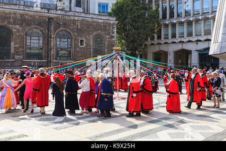 City of London, 24th Sept 2017. The Pearlies and London Mayors get involved in the Maypole Dancing. The annual Pearly Kings and Queens Harvest Festival at Guildhall Yard in the City of London,celebrate the bounty of the autumn harvest with traditional entertainment. Morris dancing, maypole dancing, marching bands and colourful characters at the traditional event Stock Photo