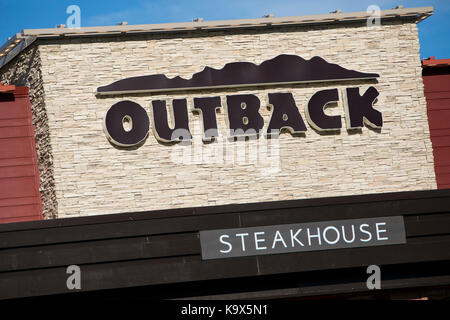 A logo sign outside of a Outback Steakhouse restaurant location in Hagerstown, Maryland on September 23, 2017. Stock Photo