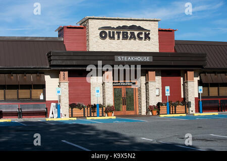 A logo sign outside of a Outback Steakhouse restaurant location in Hagerstown, Maryland on September 23, 2017. Stock Photo