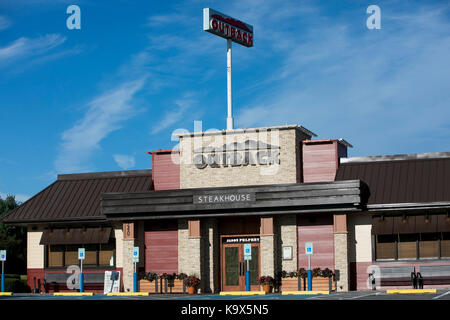 A logo sign outside of a Outback Steakhouse restaurant location in Hagerstown, Maryland on September 23, 2017. Stock Photo