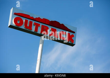 A logo sign outside of a Outback Steakhouse restaurant location in Hagerstown, Maryland on September 23, 2017. Stock Photo