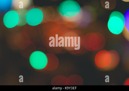 Blurred image of lights during the night(car light). vintage or retro color toned. Stock Photo