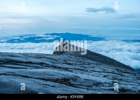 Sunrise over the summit plateau of Mount Kinabalu, the highest mountain Malaysia. Stock Photo