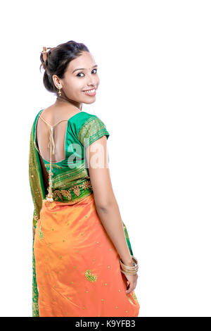 Happy young beautiful traditional Indian woman in traditional saree Stock Photo
