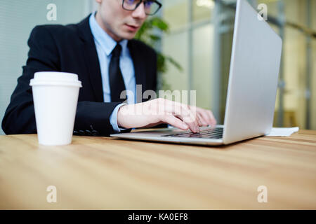 Confident Manager Using Laptop Stock Photo