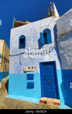 Blue and white walls of streets of buildings in the Kasbah of the Udayas in  Rabat, Morocco Stock Photo