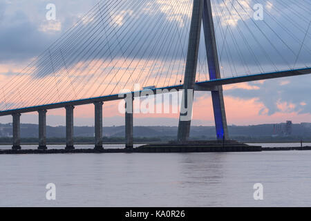 Sunrise view at Pont de Normandie, bridge over river Seine between Le Havre and Honfleur in France Stock Photo