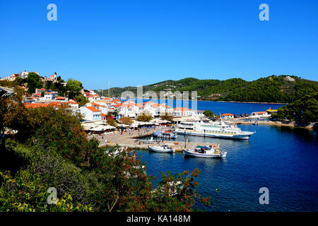 Skiathos, Greece. September 13, 2017.  The Old Port town and Bourtzi to the right and the Pounta in the background at Skiathos town on the Island of S Stock Photo