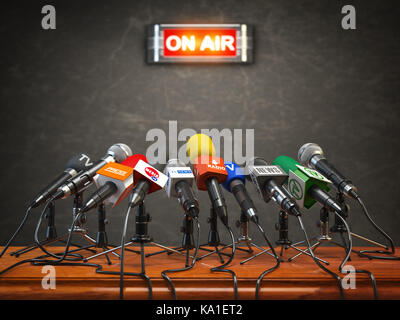 Press conference or interview on air.  Microphones of different mass media, radio, tv and press prepared for conference meeting. 3d illustration Stock Photo