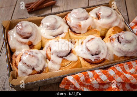 Fresh Sweet Homemade Cinnamon Rolls in baking pan Stock Photo