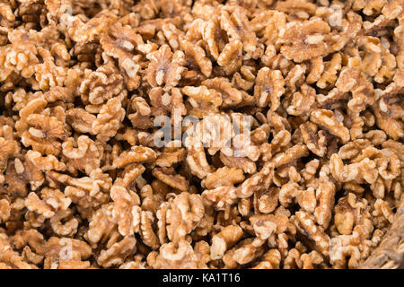 Close up shelled walnuts on market. top view Stock Photo
