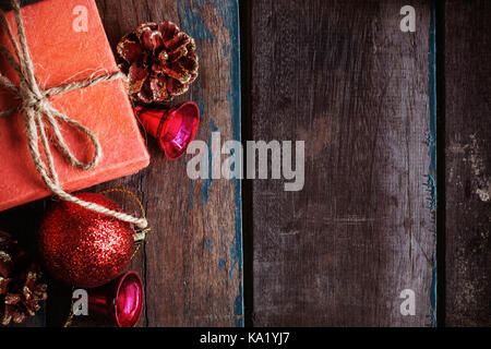 Gift boxes and balls on the wooden floor. Stock Photo
