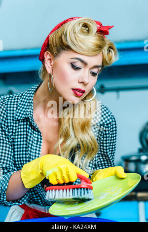 housewife washing dish Stock Photo