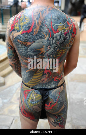 London, UK. 24th September, 2017. A man with a Japanese style body suit  tattoo at the 13th London International Tattoo Convention, which took place  over the weekend in Tobacco Dock, east London.