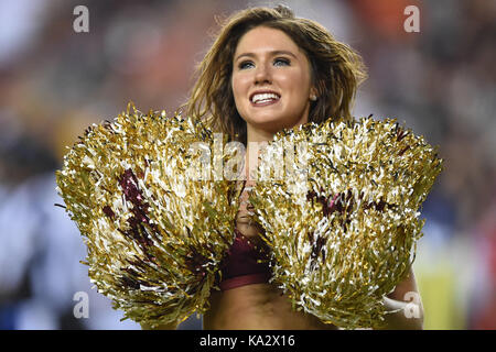 Landover, MD, USA. 24th Sep, 2017. A Washington Redskin cheerleader performs during the Sunday night matchup between the Oakland Raiders and the Washington Redskins at FedEx Field in Landover, MD. Credit: csm/Alamy Live News Stock Photo