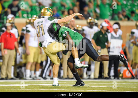 September 23, 2017: .UAB Blazers quarterback A.J. Erdely (11) is driven into the ground by North Texas Mean Green linebacker E.J. Ejiya (22) during an NCAA Football game between the Univerisity Alabama Birmingham Blazers and the North Texas Mean-Green Eagles at Apogee Stadium in Denton, Texas. Manny Flores/CSM Stock Photo