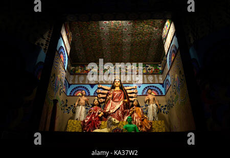 Kolkata, India. 24th Sep, 2017. View of Goddess Durga idol at 66 Pally Durga Puja ahead of Durga Puja festival in Kolkata. Community Durga Puja pandal or temporary stage and Durga Idols are decorated ahead of Durga Puja festival on September 24, 2017 in Kolkata. The annual five days festival begins on September 26 and worship Goddess Durga who symbolized power and the triumph of good over evil in Hindu mythology. Credit: Saikat Paul/Pacific Press/Alamy Live News Stock Photo