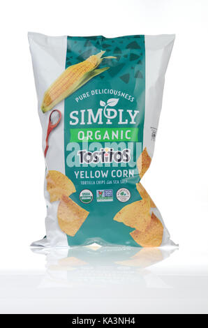 Bag of Frito-Lay Simply Organic Tostitos Yellow Corn Tortilla Chips on white background isolate, USA. Stock Photo