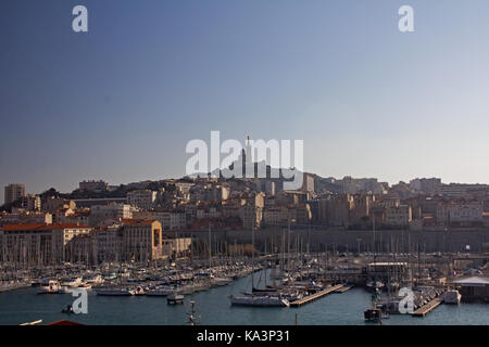 Panoramic shot of the Marseille habor and cityscape to the Basilique Notre Dame de la Garde Stock Photo