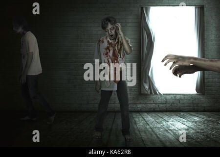 Group of scary asian zombies walking around in an abandoned house Stock Photo