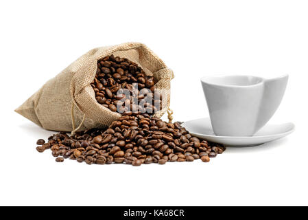 Coffee beans in jute sack  and  espresso cup isolated on white background Stock Photo