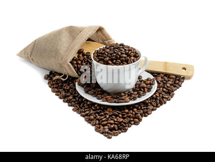 Coffee beans heart shape and  cup isolated on white background Stock Photo