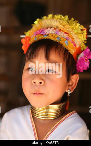 Long Neck girl pagan tribe Karen  (Padaung)  tribe with rings on neck in Thailand. Repression Karen in Myanmar forced them to flee to Thailand Stock Photo
