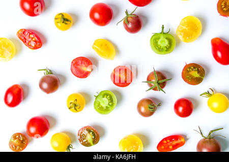 Red yellow and green cherry tomatoes background flat lay Stock Photo