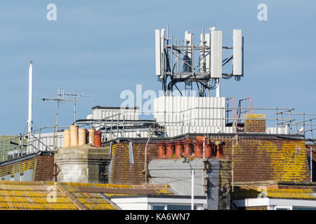 Mobile phone masts in the UK. Cell tower antennas for mobile network in the UK. Stock Photo