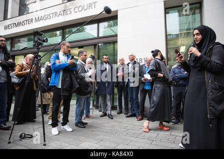 London, UK. 25th Sep, 2017. A woman speaks in support of Muhammad Rabbani, Director of CAGE, a British civil liberties organisation founded in 2003 to protect detainees of the Global War on Terror, outside his hearing at Westminster Magistrates Court for “wilfully obstructing or seeking to frustrate a Schedule 7 search” following his arrest last November at Heathrow Airport when he refused to disclose to counter-terrorism authorities passwords required to unlock files. Credit: Mark Kerrison/Alamy Live News Stock Photo