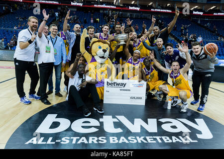 London, UK. 24th Sep, 2017. Betway All-Stars Basketball Championship at The 02 London Lions win inaugural betway British Basketball All-Stars Championship beating Newcastle Eagles 26 vs 25. London Lions Team with coaches celebrate the win of £25,000. (c) Credit: pmgimaging/Alamy Live News Stock Photo