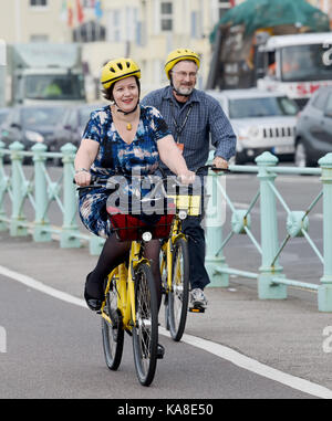 Brighton, UK. 26th Sep, 2017. Labour Party MP Meg Hillier (Chair of the Public Accounts Commitee) takes part in a cycle ride along Brighton seafront on ofo station-free bikes to raise money for the British Heart Foundation during this weeks Labour Party Conference in the city Credit: Simon Dack/Alamy Live News Stock Photo