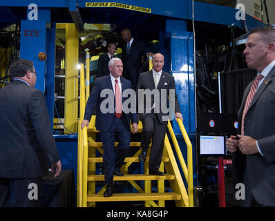 United States Vice President Mike Pence, left, and US Representative Robert Aderholt (Republican of Alabama) exit the Space Launch System (SLS) structural test stand after having been given a tour, Monday, Sept. 25, 2017 at the NASA Marshall Space Flight Center in Huntsville, Alabama. The Vice President visited the space center to view test hardware for NASA's Space Launch System, America's new deep space rocket and to call the crew onboard the International Space Station. Mandatory Credit: Bill Ingalls/NASA via CNP /MediaPunch Stock Photo