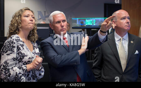 Marshall Space Flight Center International Space Station Payload Operations Director Stephanie Dudley, left, shows United States Vice President Mike Pence, center, and US Representative Robert Aderholt (Republican of Alabama), the Payload Operations Integration Center (POIC) of the NASA Marshall Space Flight Center, Monday, Sept. 25, 2017 in Huntsville, Alabama. The Vice President visited the space center to view test hardware for NASA's Space Launch System, America's new deep space rocket and to call the crew onboard the International Space Station. Mandatory Credit: Bill Ingalls/NASA via Stock Photo