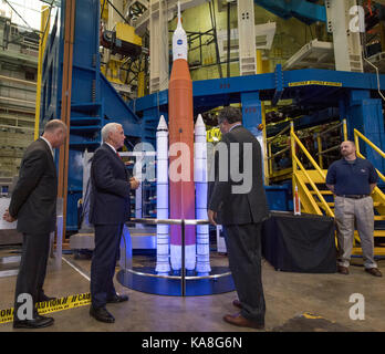 United States Vice President Mike Pence, second from left, is given an overview of the Space Launch System (SLS) structural test stand by NASA Marshall Space Flight Center Director Todd May, right, as US Representative Robert Aderholt (Republican of Alabama) looks on Monday, Sept. 25, 2017 at the NASA Marshall Space Flight Center in Huntsville, Alabama. The Vice President visited the space center to view test hardware for NASA's Space Launch System, America's new deep space rocket and to call the crew onboard the International Space Station. Mandatory Credit: Bill Ingalls/NASA via CNP /Medi Stock Photo