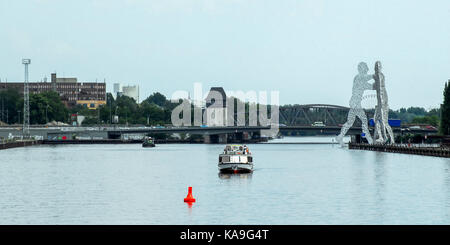 BERLIN-MAY 31: View of the river Spree with the sculpture Molecule Man on the right,Berlin,Germany,on May 31,2011. Stock Photo